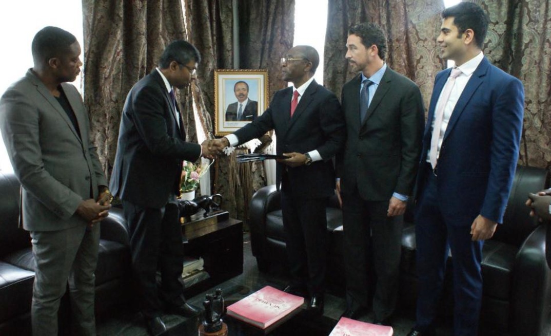Signing the mining agreement with Cameroon's government last September.