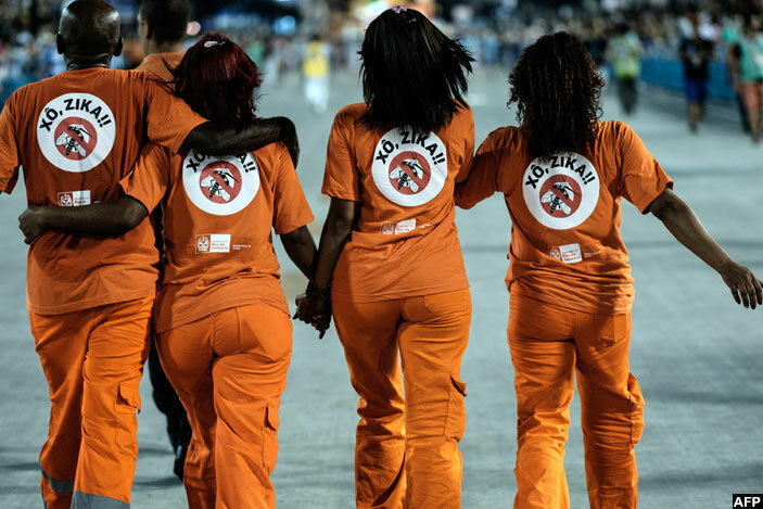  itys cleaning workers are seen with the words ut ika in ortuguese on their uniforms between the samba schools during the second night of the carnival parade at ambadrome in io de aneiro razil on ebruary 9 2016