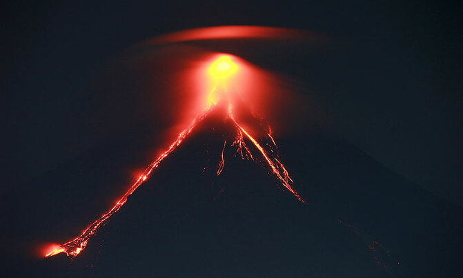 Volcano 'fireworks' draw tourists as residents flee Volcano 'fireworks' draw tourists as residents flee
