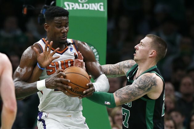 Booker dominates, Suns clip short-handed Celtics