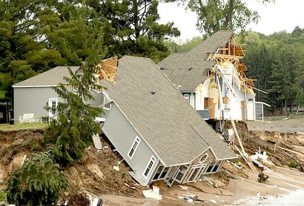 Houses collapse due to water main break in Washington