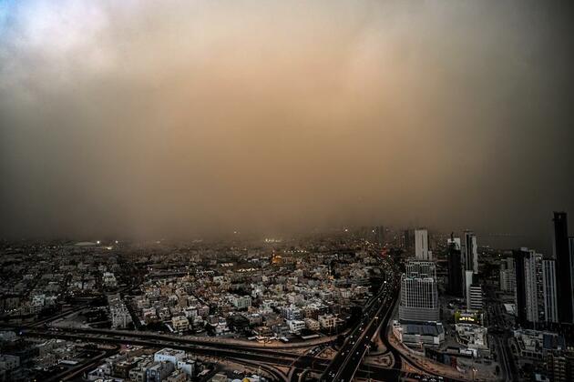 Mideast in Pictures: Dust storm sweeps across Kuwait