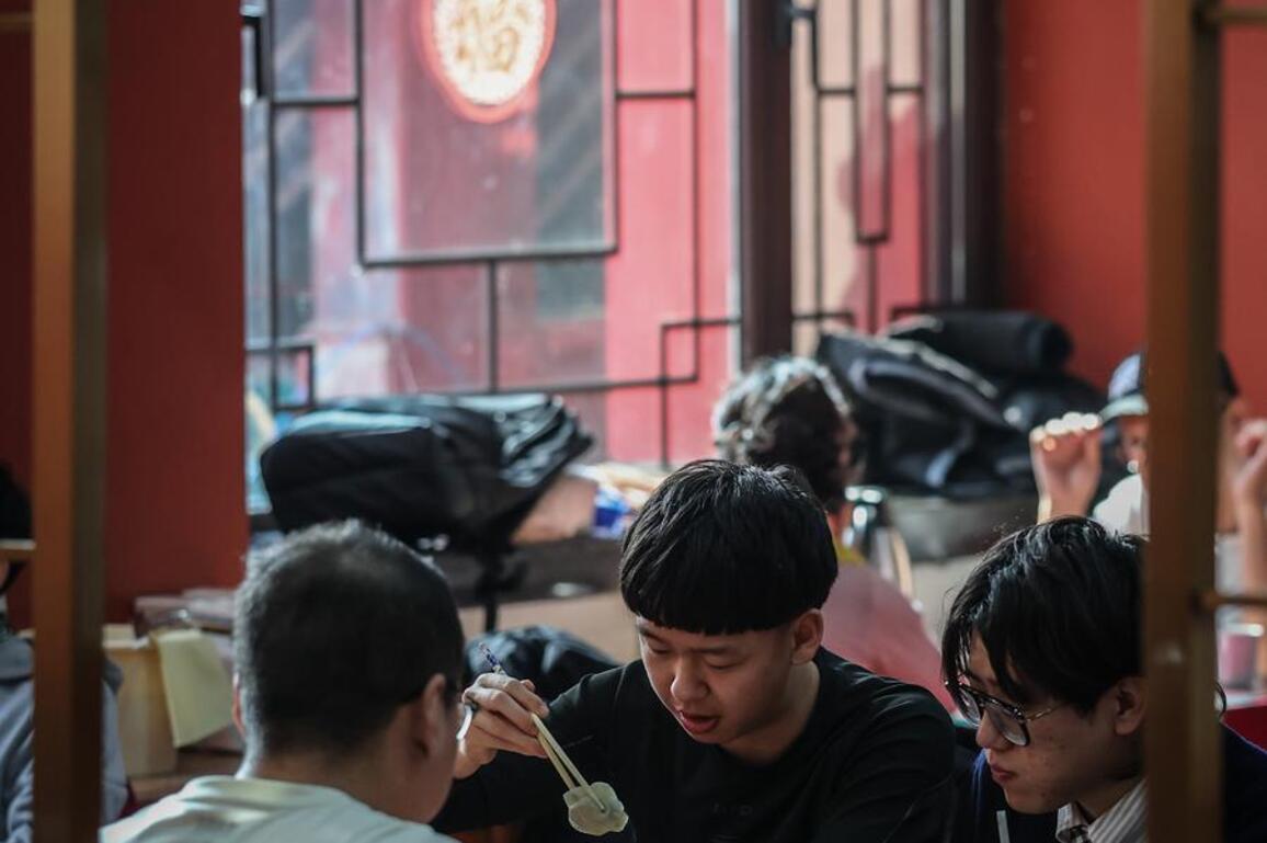 InPics | Dumpling-eating tradition observed during Chinese New Year