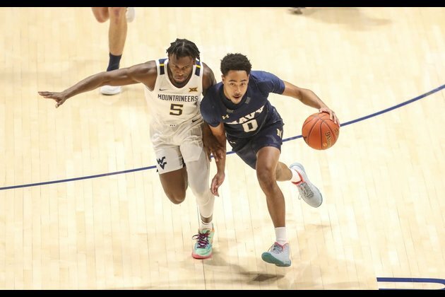 West Virginia pulls away in second half to down Navy