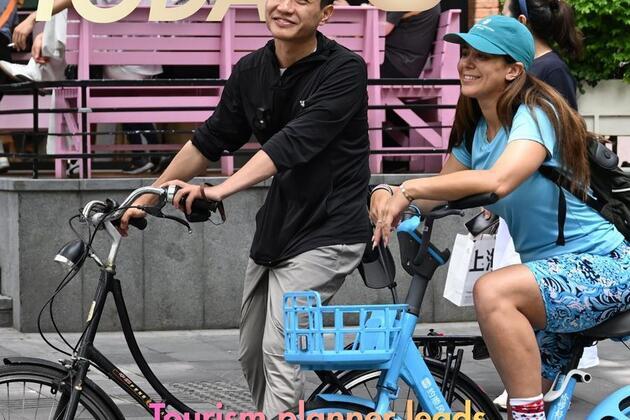 ChineseToday | Tourism planner leads foreigners to explore true nature of Shanghai
