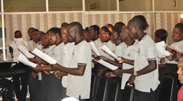  oly artyrs hoir from amugongo atholic artyrs hrine in action during the mass at ision roup on riday