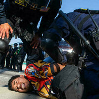 'Mass arrests' underway as LA police enforce overnight curfew