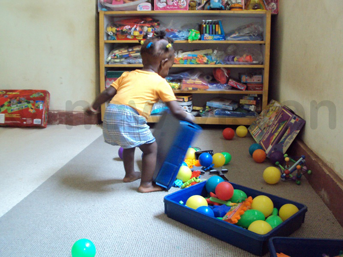 child using the play corner in her bedroom hoto by ovita irembe