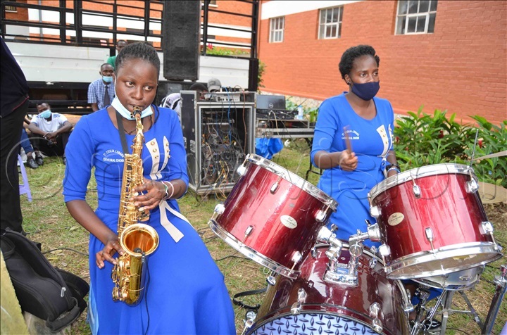 Saxophonist Cissy Lubuulwa and jazz drummer Olivia Kavuba of St Cecilia Lubaga Cathedral Choir in action during the choir's Christmas Concert