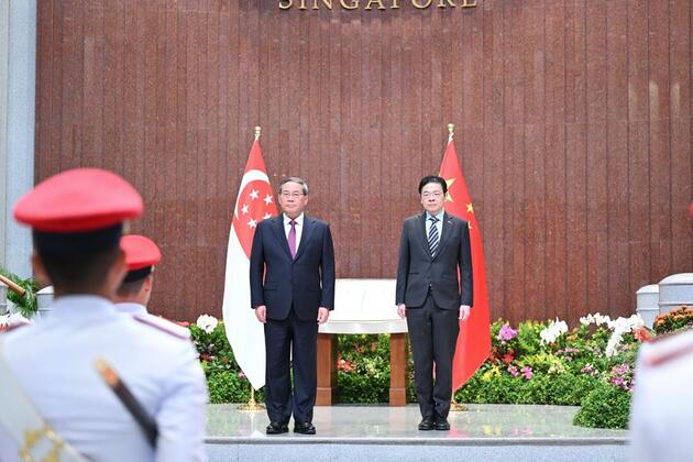 Chinese premier pledges joint efforts with Singapore for more just, equitable world order
