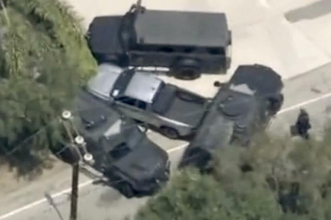 Police pursuit ends in standoff with SWAT team and armored vehicles