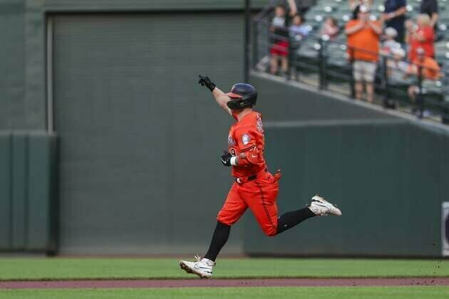Orioles put 18 runs, shut out lowly Rockies
