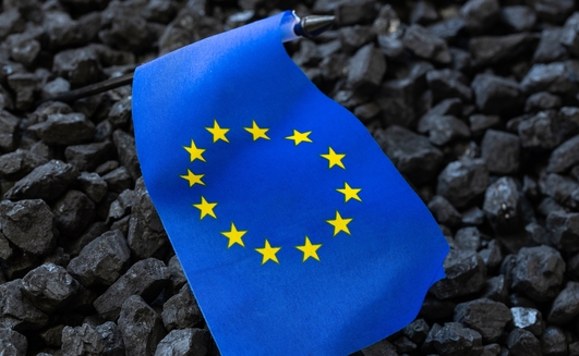 European Union flag against the background of coal