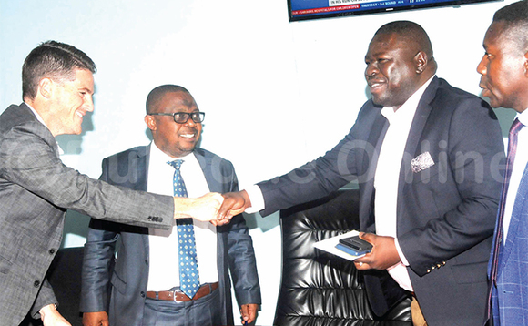 Mckinstry (ku kkono) ng'abuuza ku ssaabawandiisi wa NCS, Dr. Bernard Ogwel. Owookubiri ku kkono ye Justus Mugisha, pulezidenti wa FUFA ow'ekiseera ne David Mckinstry (ku kkono) ng'abuuza ku ssaabawandiisi wa NCS, Dr. Bernard Ogwel. Owookubiri ku kkono ye Justus Mugisha, pulezidenti wa FUFA ow'ekiseera ne David