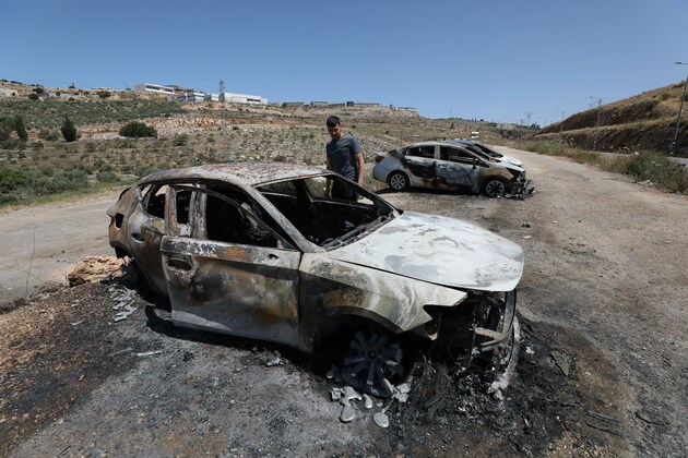 MIDEAST-SALFIT-ISRAELI SETTLERS-BURNED CARS