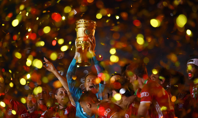 Neuer says Bayern 'hungry' for treble after Cup triumph Neuer says Bayern 'hungry' for treble after Cup triumph
