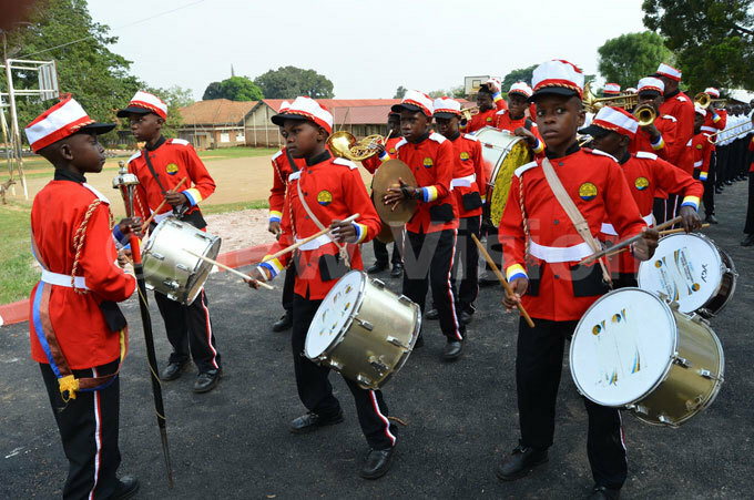  he brass ensemble from ugwanya reparatory chool abojja entertains the guests
