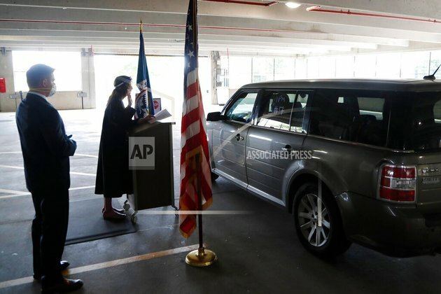 Drive-up US Citizenship Eases Backlog, But New Threat Looms
