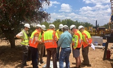  Analysts looking at drill core during a visit to MOD's Kalahari project in February 2018