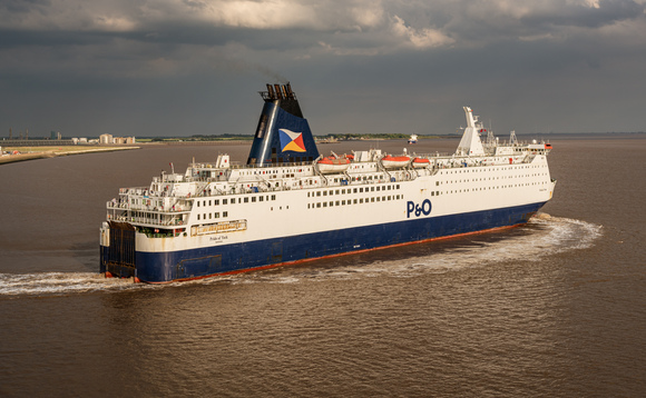A P&O ferry leaving the harbour and navigating on the River Humber