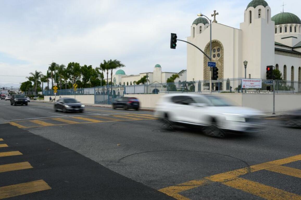 Father handed gun to son in alleged drive-by gang killing, LAPD says