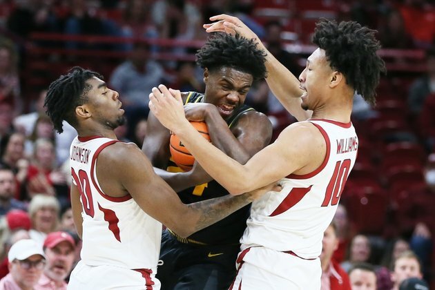 Arkansas demolishes Missouri for first SEC win