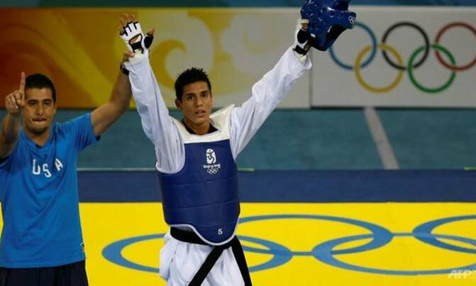 Four women sue USOC, USA Taekwondo over sex trafficking Four women sue USOC, USA Taekwondo over sex trafficking