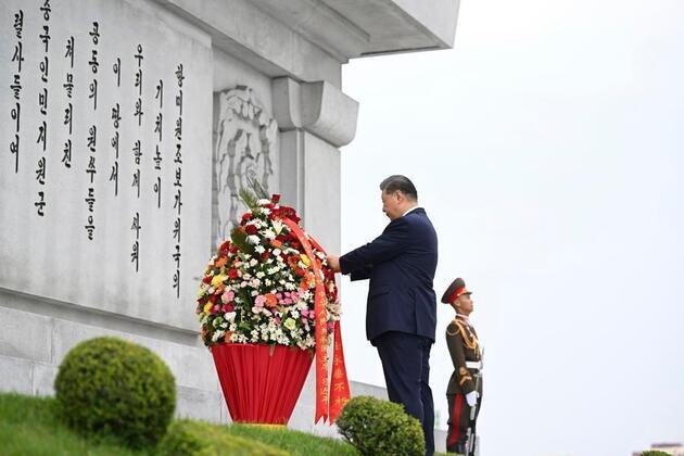 Xi, Kim pledge to carry forward great traditional China-DPRK friendship through generations