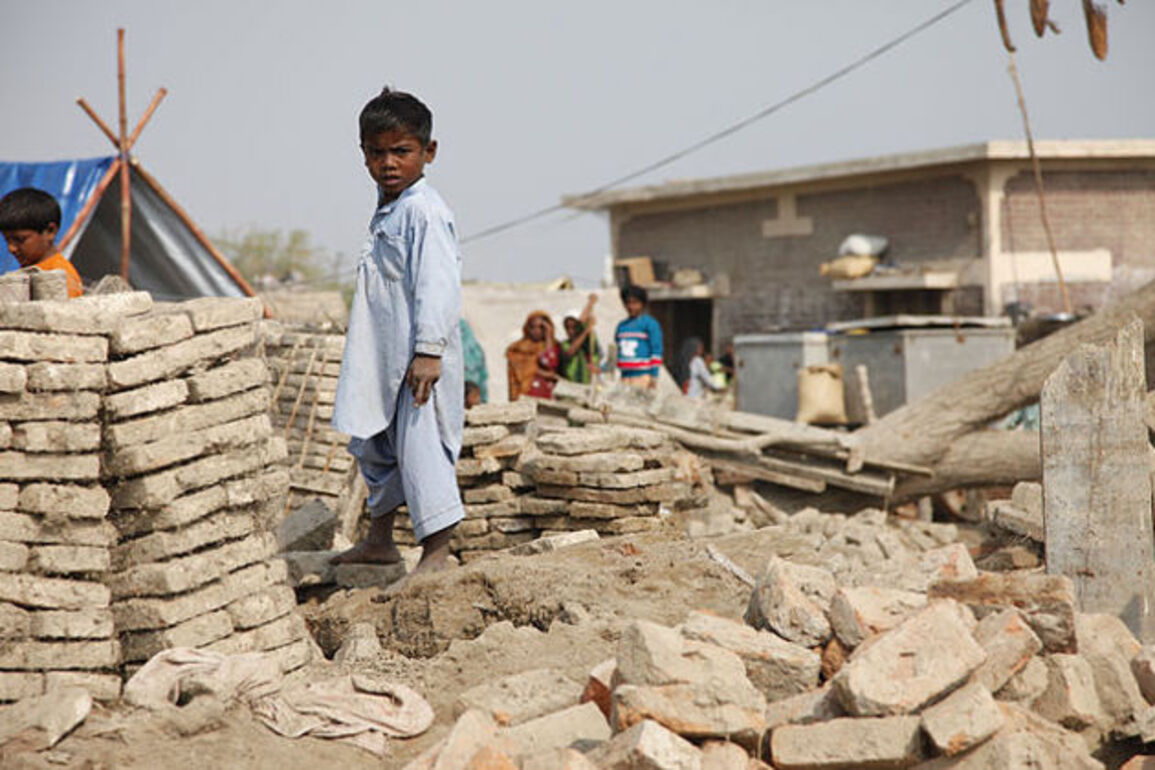 Mass evacuations as floods ravage Kashmir and Pakistan