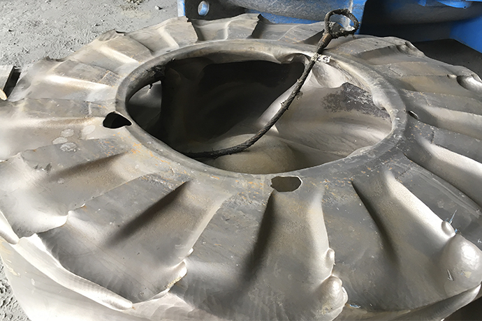This non-OEM metal impeller installed in a cyclone feed pump failed prematurely at a major copper mine, while a genuine Warman® impeller safely doubled the wear life. 
