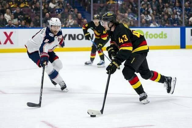 Quinn Hughes takes on Zach Werenski as Canucks host Blue Jackets