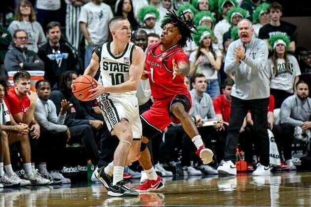 No. 8 Michigan State holds off Rutgers to clinch Big Ten triple-bye