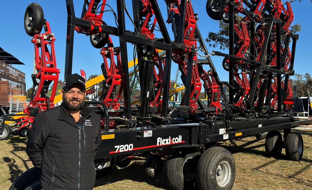 The Flexi-Coil 7200 Precision Hoe Drill pictured with product manager Andrew Kissel at the Henty Field Days. Photo: Case IH.