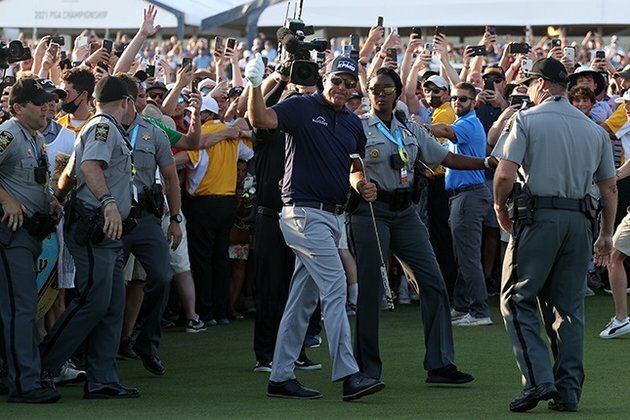 Fan chaos at PGA finish delights champion Mickelson, upsets Koepka