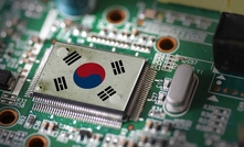 Flag of South Korea on a processor. Credit: Tang Yan Song via Shutterstock.