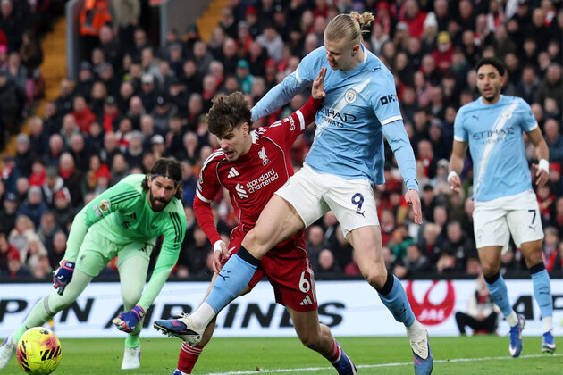 Haaland's late penalty seals 2-1 comeback win for Man City against Liverpool