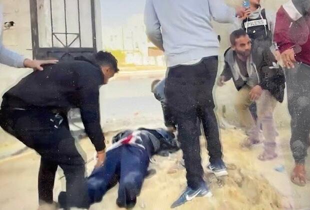 Outrage as Gazan man holding white flag is shot dead after being filmed by ITV