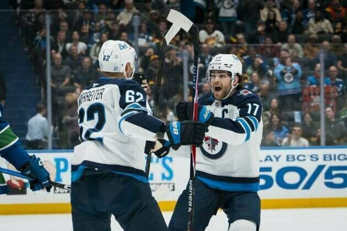 Josh Morrissey's goal, 2 assists steer Jets past Canucks