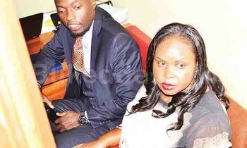 Teddy Bugingo ne looya we Julius Galisonga mu kkooti. Teddy Bugingo ne looya we Julius Galisonga mu kkooti.