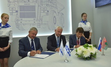  Alexander Galkin from Region 42, Piotr Parkhomchik from Belaz and Dmitry Vladimirov from VIST Group sign the agreement