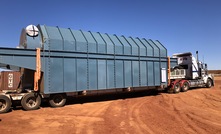 The kiln dryer arriving on site