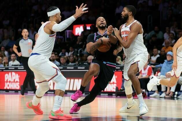 Heat weather Knicks' late flurry to win at home