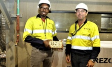 Orezone’s Burkina Faso Country Manager, Ousseni Derra and VP, Project Development, Ricardo Rodrigues holding the first gold doré bar from the Bomboré Mine.