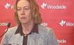 Woodside CEO Meg O'Neill and Chair Richard Goyder face media scrutiny at last year's fiery AGM in Perth.