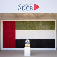 ADCB sets Guinness World Record with largest biodegradable UAE flag