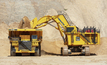 A Komatsu haul truck and excavator.