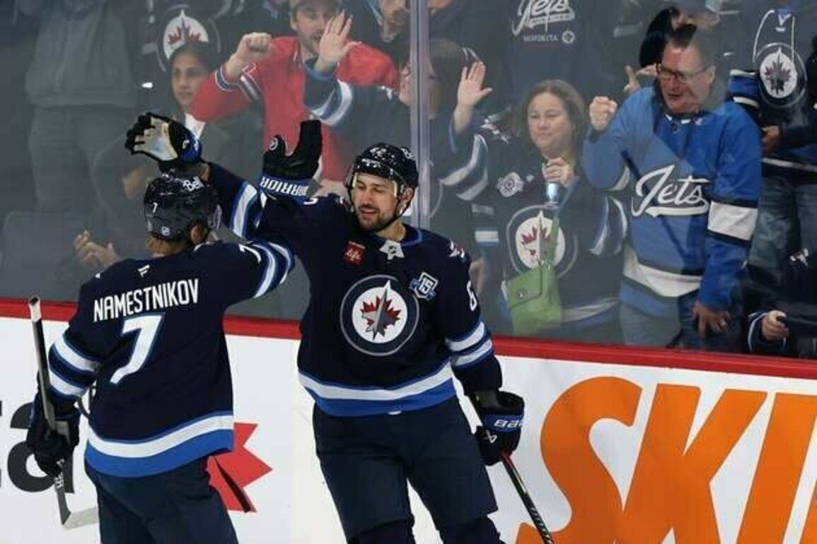 Mark Scheifele sets franchise points record as Jets roll past Predators
