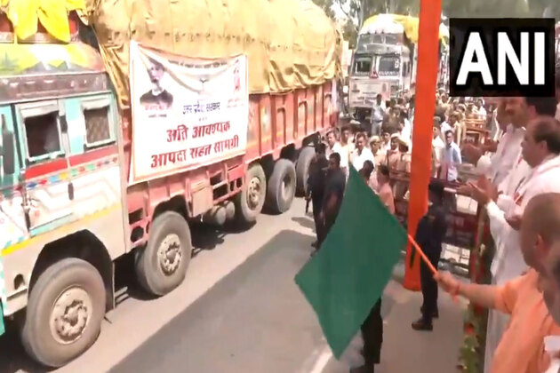 UP CM Yogi flags of 48 trucks of relief materials to flood-affected states