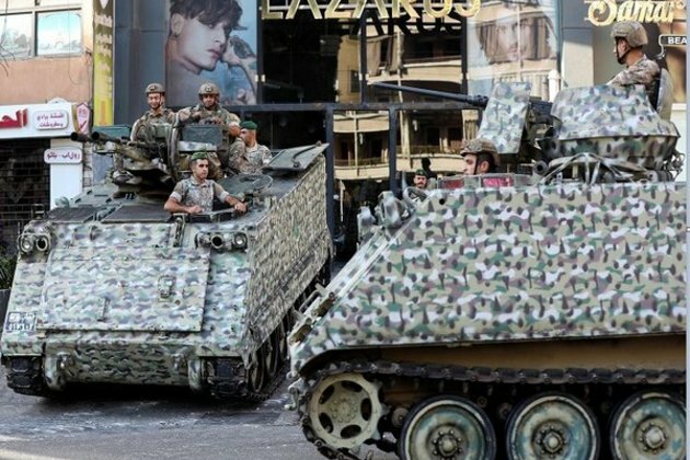 Sectarian militias clash in Beirut raising fears of repetition of 15-year civil war