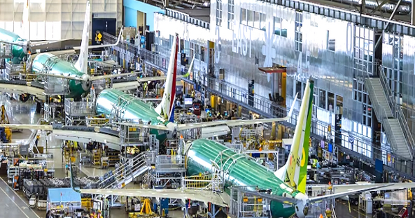 Boeing workers reject four-year deal, authorize potential strike